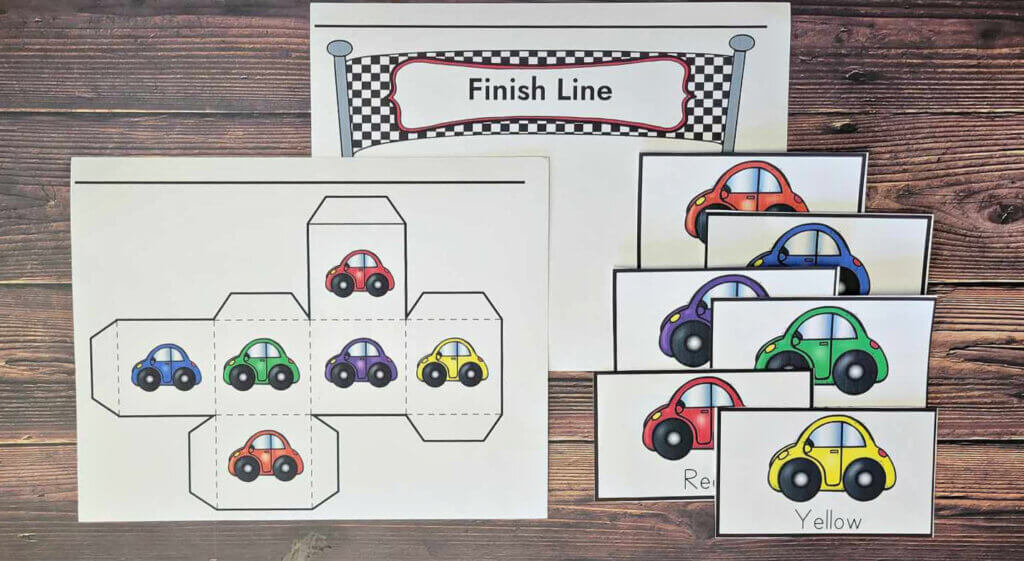 View of the printables for the rainbow racers color game. Die printable, car printable and finish line