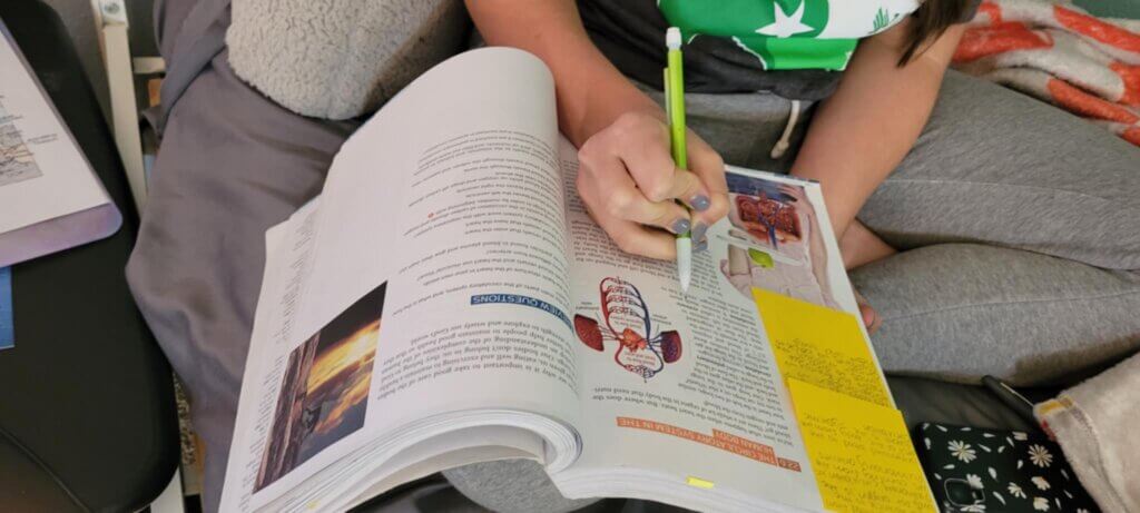 BJU biology book with girl studying